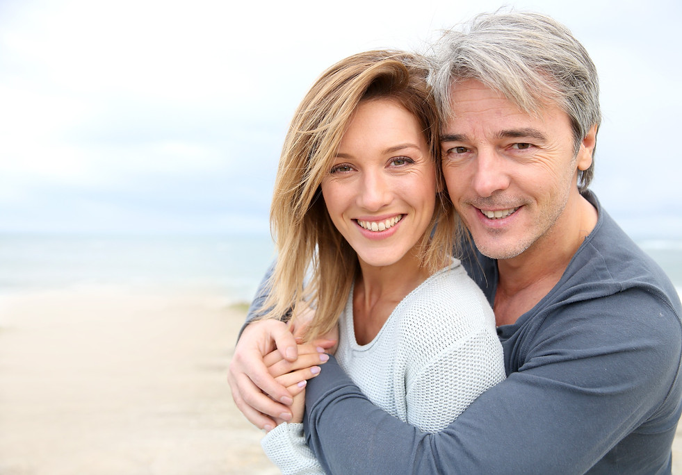 Cheerful mature couple 20 embracing