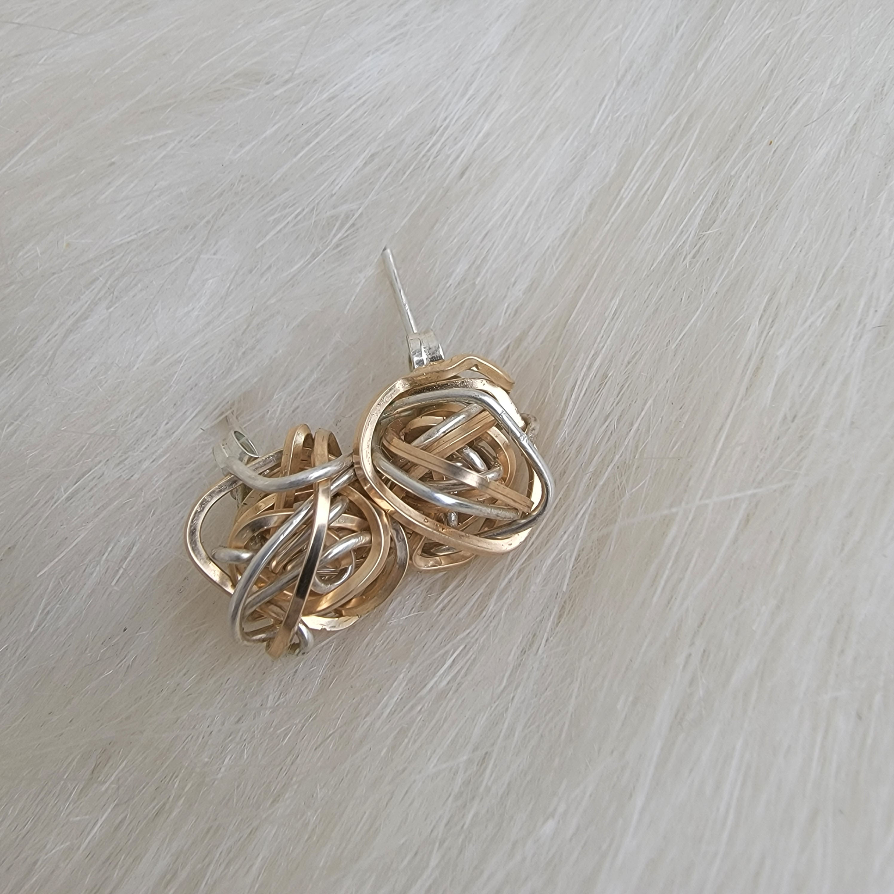 Two tone mixed metal love knot stud earrings