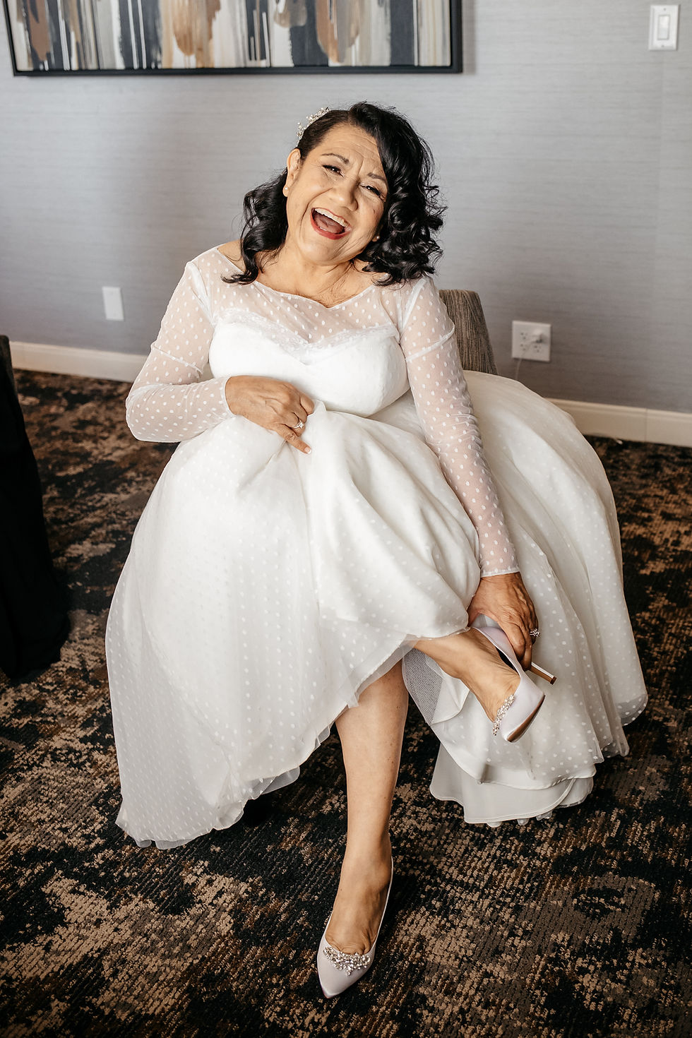 Dallas bride getting ready for her vow renewal featured in wedding blog