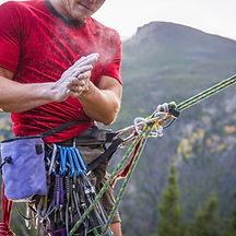 Rock Climber Powdering Hands