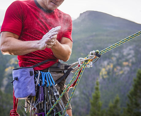 Rock Climber Powdering Hands
