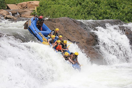 Call-em-crazy-Dropping-into-the-Class-5+rapids-on-the-Nile-Uganda.jpeg