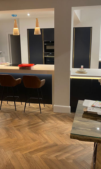 Finished Kitchen refurbishment. White, navy and brown colour palette  Saville Construction, Worcestershire.