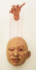 WHO PULLS THE STRINGS