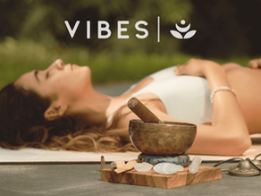 woman lying down in a sound bath