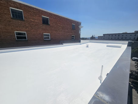 Commercial flat roof with a clean white surface