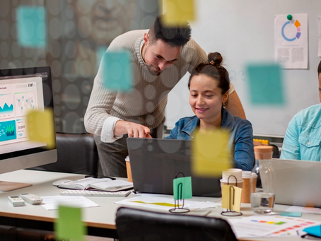 Gen Z employees collaborating in a modern office, representing the new workplace trends and influence of young professionals on India’s job market.