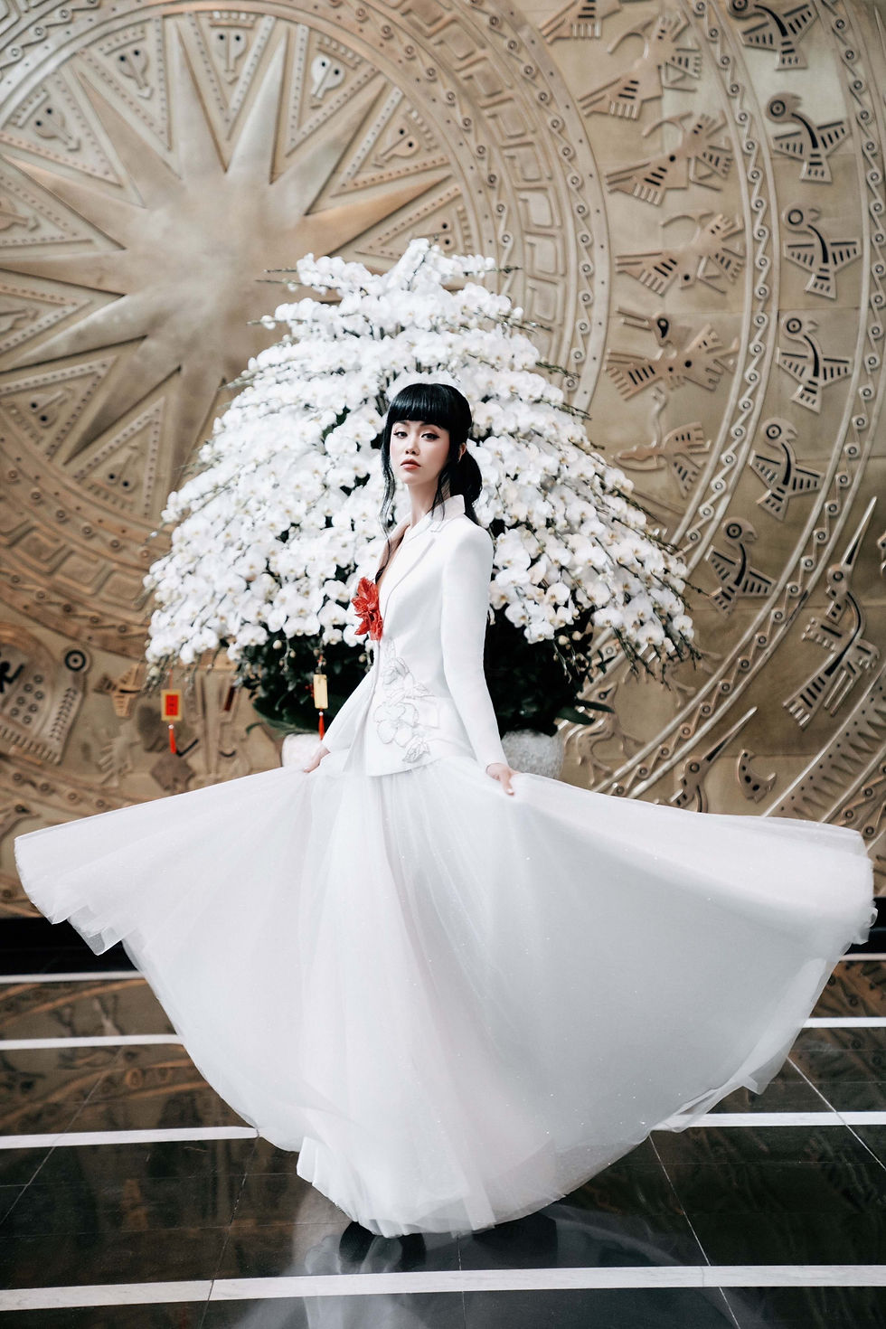 Jessica Minh Anh at VTV catwalking in a white dress