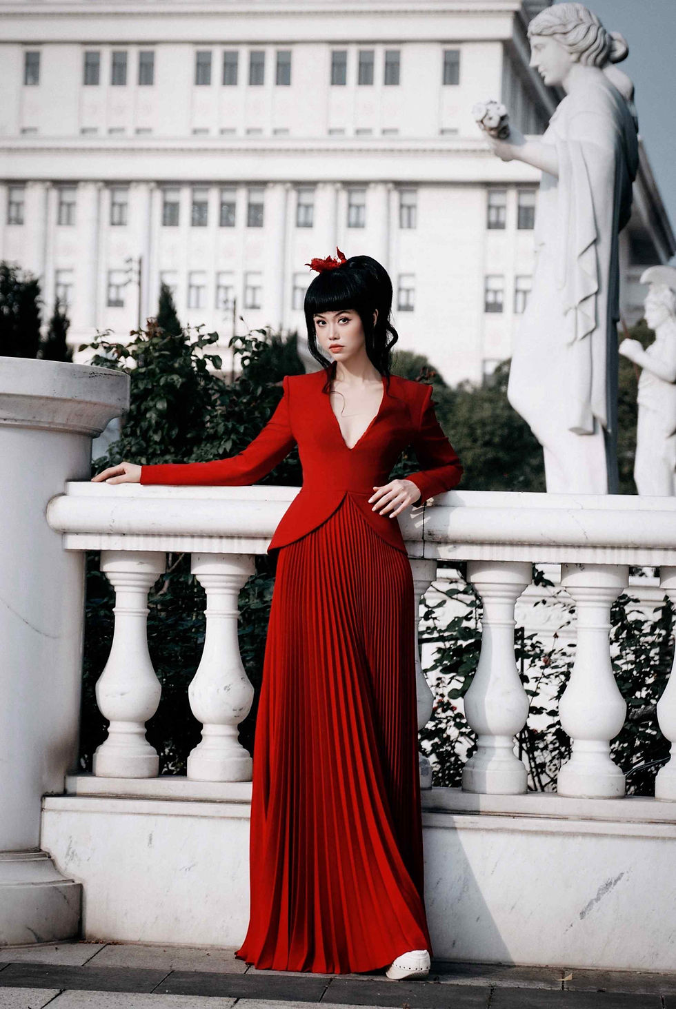 Supermodel and show producer Jessica Minh Anh visited VinUniversity in Hanoi, Vietnam in a stunning red dress.