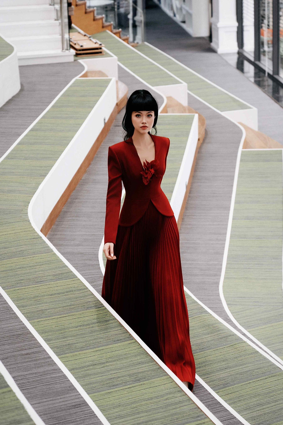 Supermodel and show producer Jessica Minh Anh visited VinUniversity in Hanoi, Vietnam in a stunning red dress.