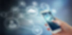 Hand holding phone, network connections