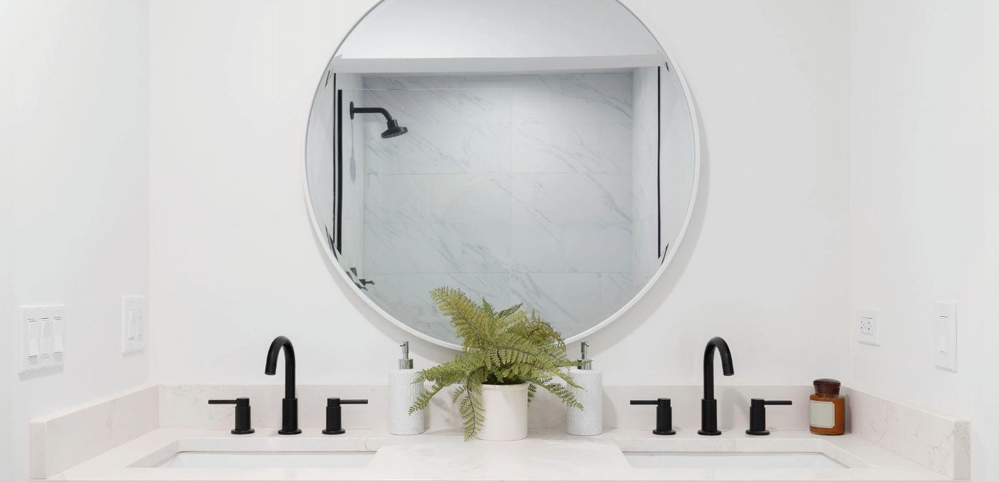 Modern bathroom double vanity by General Contractor OC