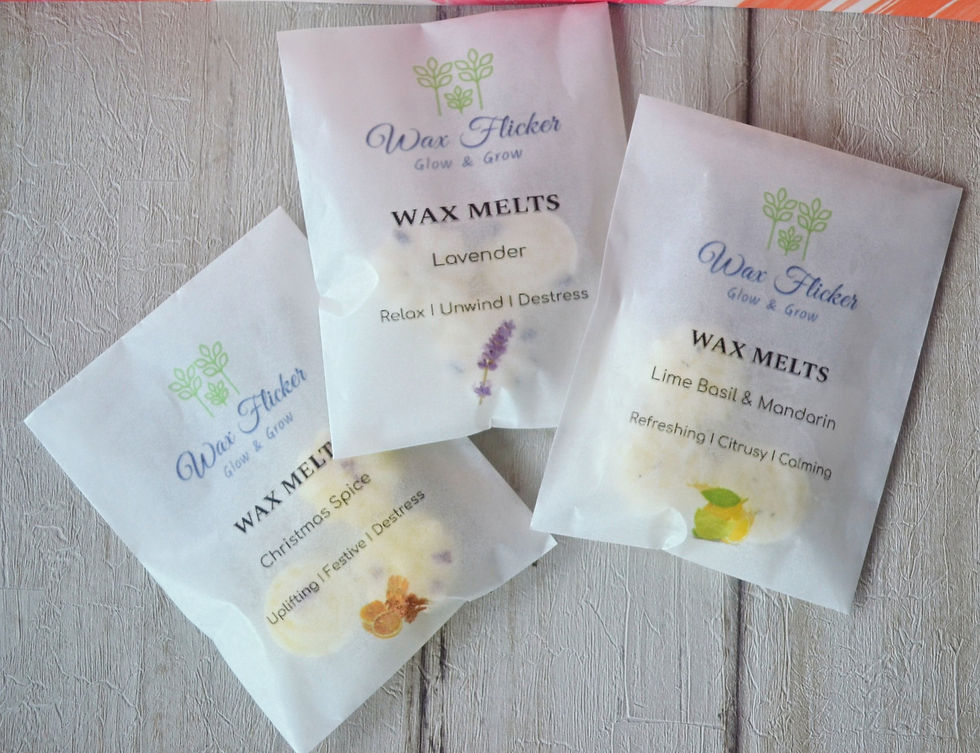 Three bags of wax melts on a table.