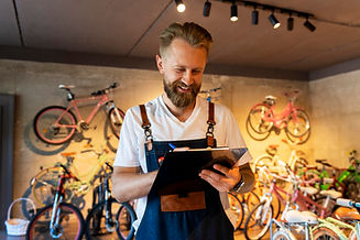 close-up-young-businessman-bike-shop.jpg
