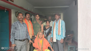 Elderly woman wheelchair distribution