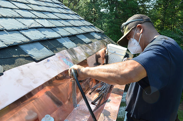 Man-Working-on-roof_Midsouth.jpg