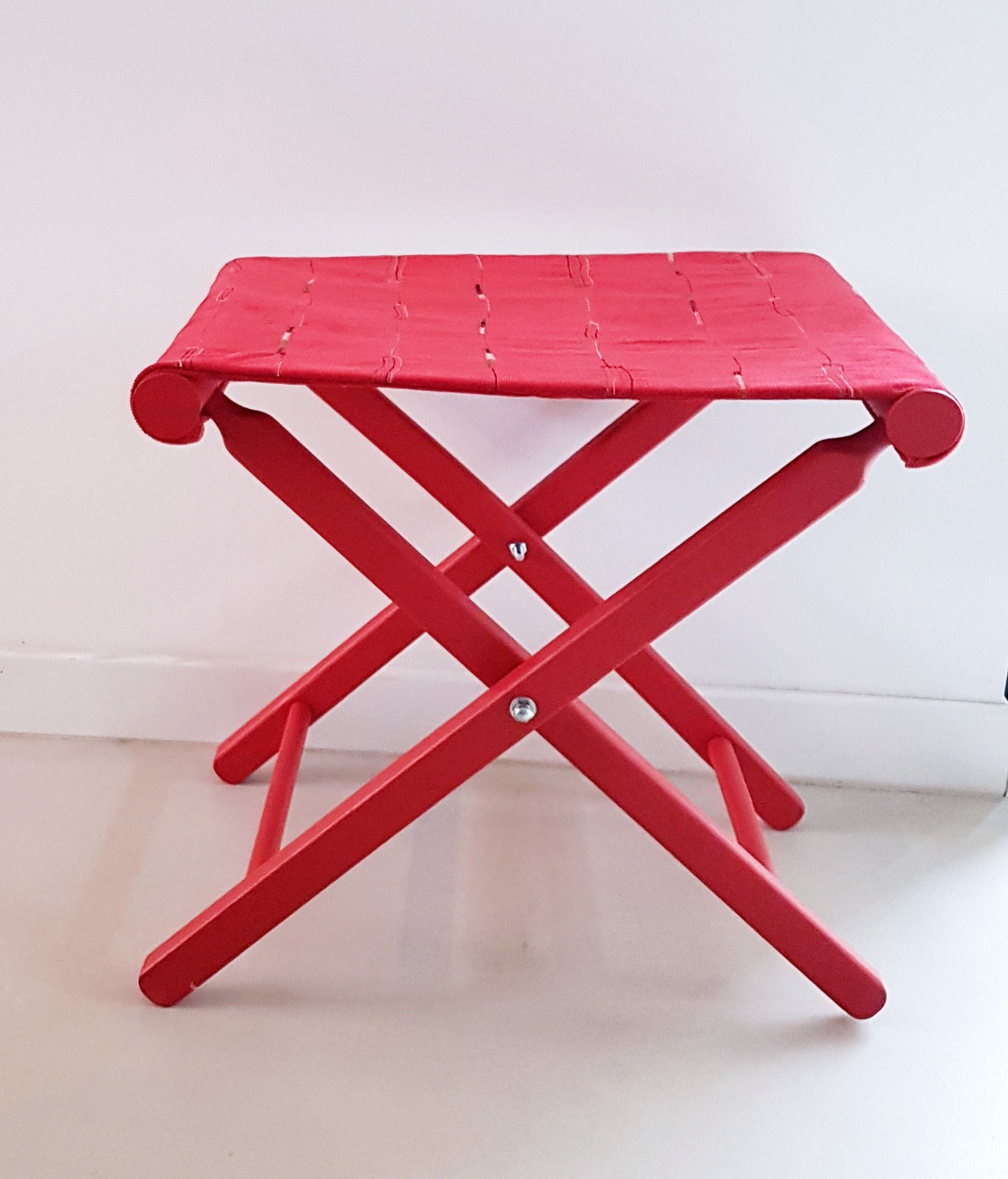 Tabouret pliant rouge