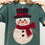 Miniaturbild: Embroidery Snowman PNG – cute stitched snowman with red scarf and plaid hat, Christmas sublimation design for shirts and mugs