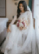 Close-up of hand-stitched embroidery and bead detailing