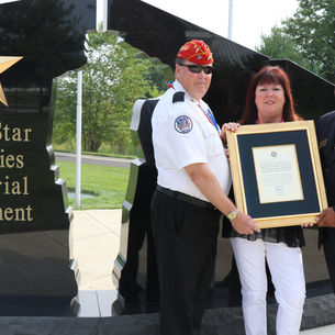 John & Bernadette Heenan presented a proclamation from Senator Pat Toomey (R-PA) to Director Gregory J. Whitney.