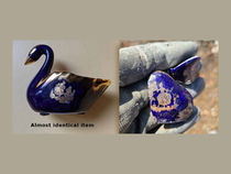 Limoges cobalt blue porcelain swan - photo from Etsy