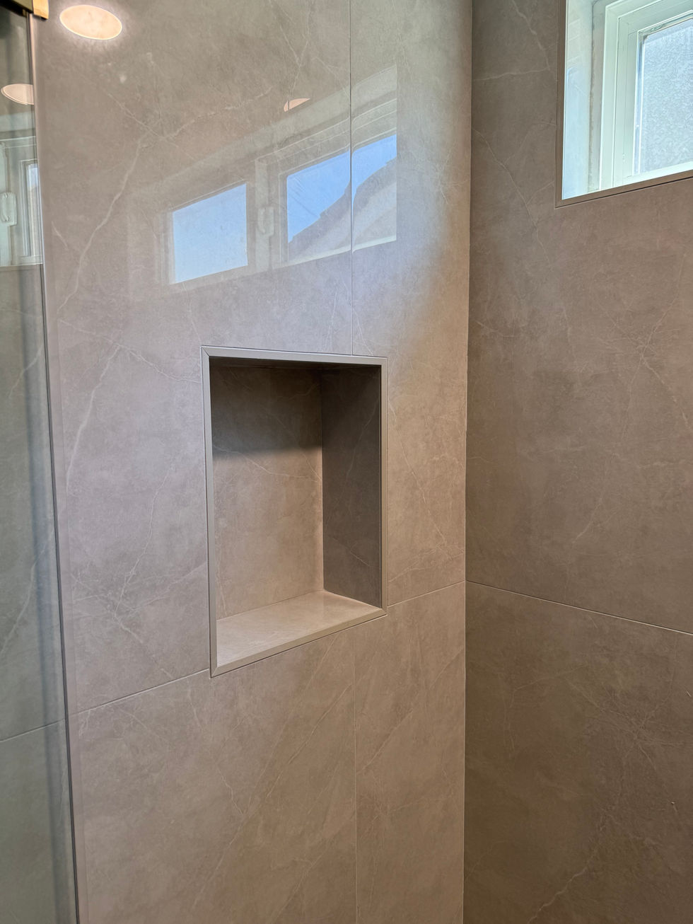 Spacious bathroom layout in an Orange renovation.