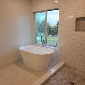 Modern freestanding bathtub installation in Mission Viejo.