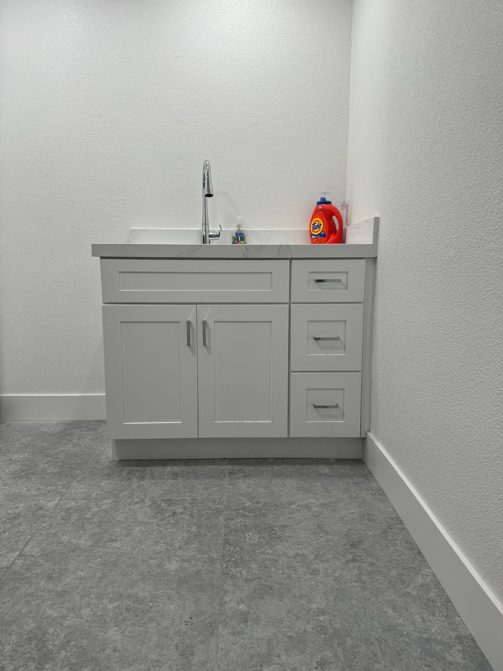 Custom bathroom storage cabinetry and organization.