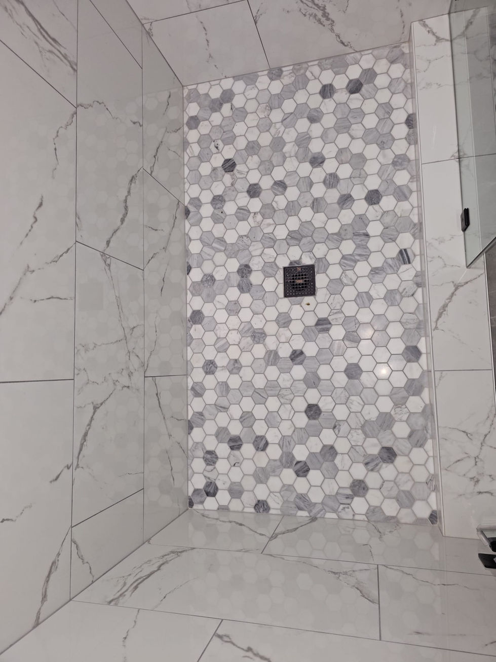 Functional and stylish bathroom space remodeled by Modern Renovations.