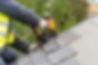 Man Repairing Shingles