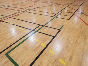 Multi-sport athletic court with clear, colorful striping
