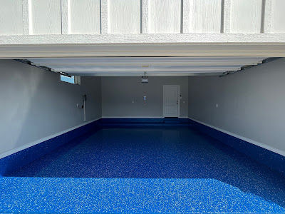 Blue epoxy flooring in a Central Texas garage