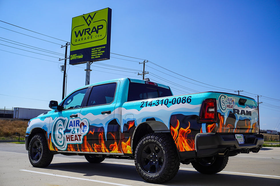 Wide-angle view of a clean wrapped work van parked on a Dallas street.
