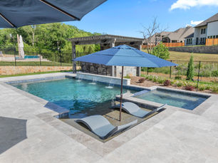 Custom Pool with Tanning Ledge and Outdoor Kitchen