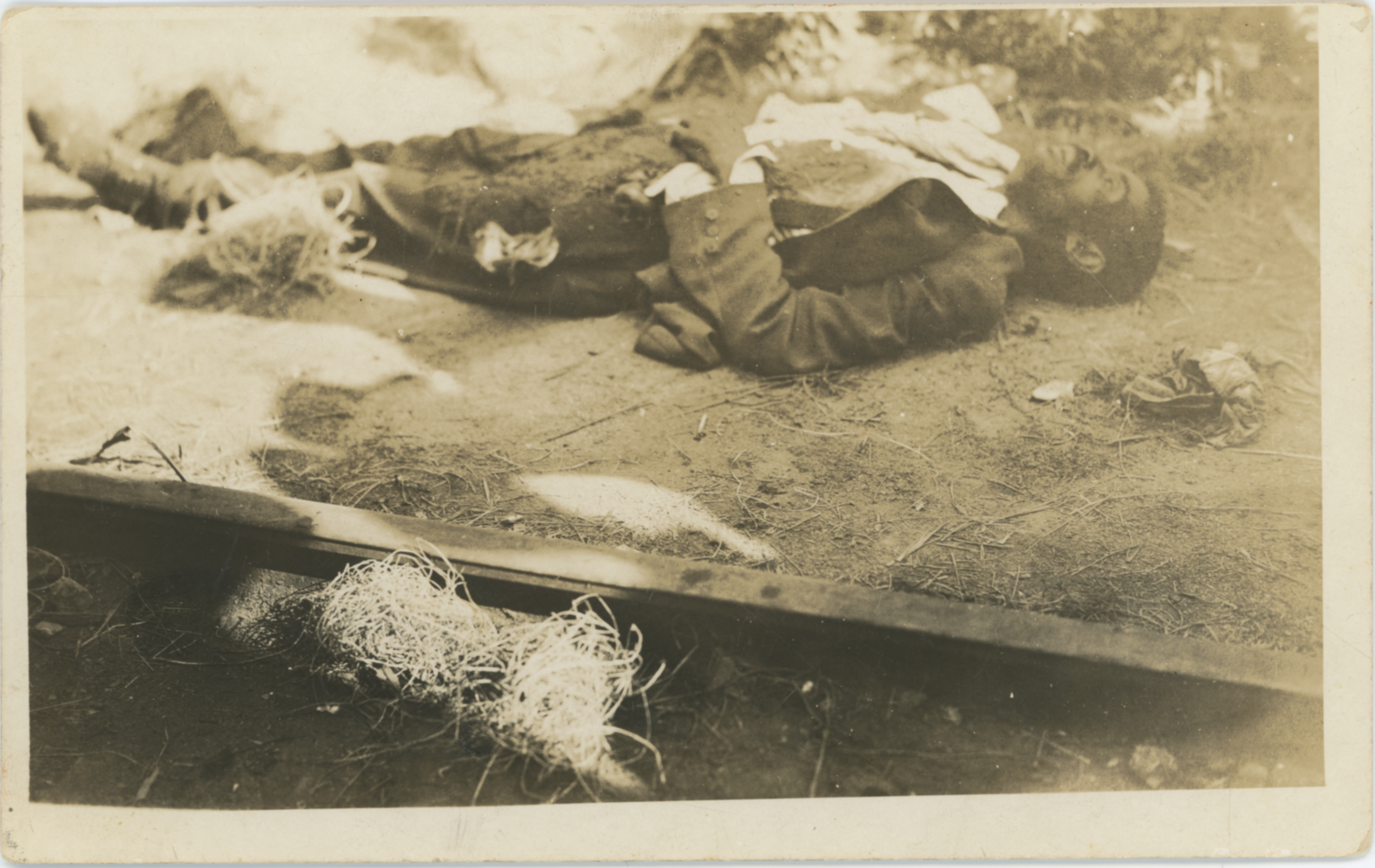 Deceased blk man by railroad tracks
