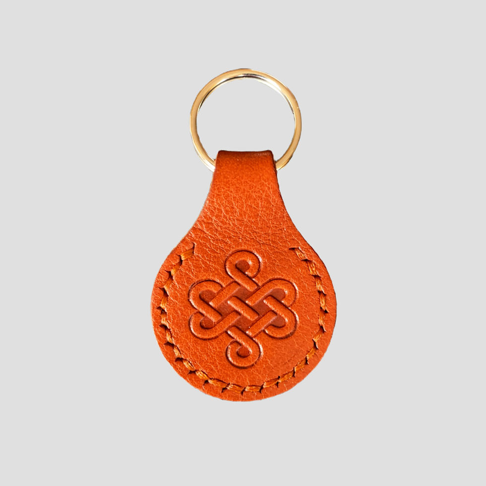 Celtic knot orange leather keyring
