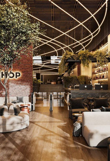 Interior with sofas and the word WORKSHOP on the wall, modern design.