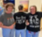 Healthcare professionals in customized scrubs and embroidered lab coats working in a clean clinical environment, highlighting specialized medical apparel