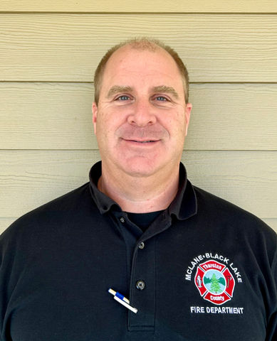 man in polo fire department shirt