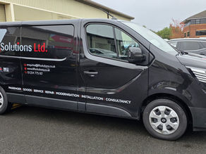 black van with sign writing