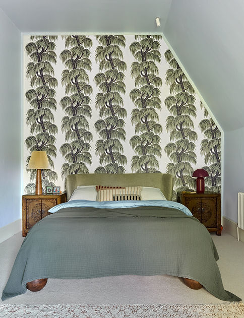 Wallpaper feature behind bed large lamp bedside table