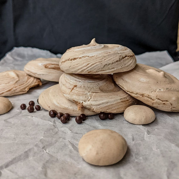 Introduction image the blog. It's a photograph of chocolate meringue swrils stacked up on each other.