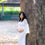 Thumbnail: White fishtail gown with long sleeves