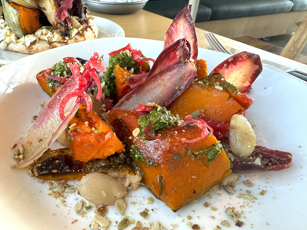 Roast squash and chicory with miso and butterbean hummus with seeds at Babble in Hove