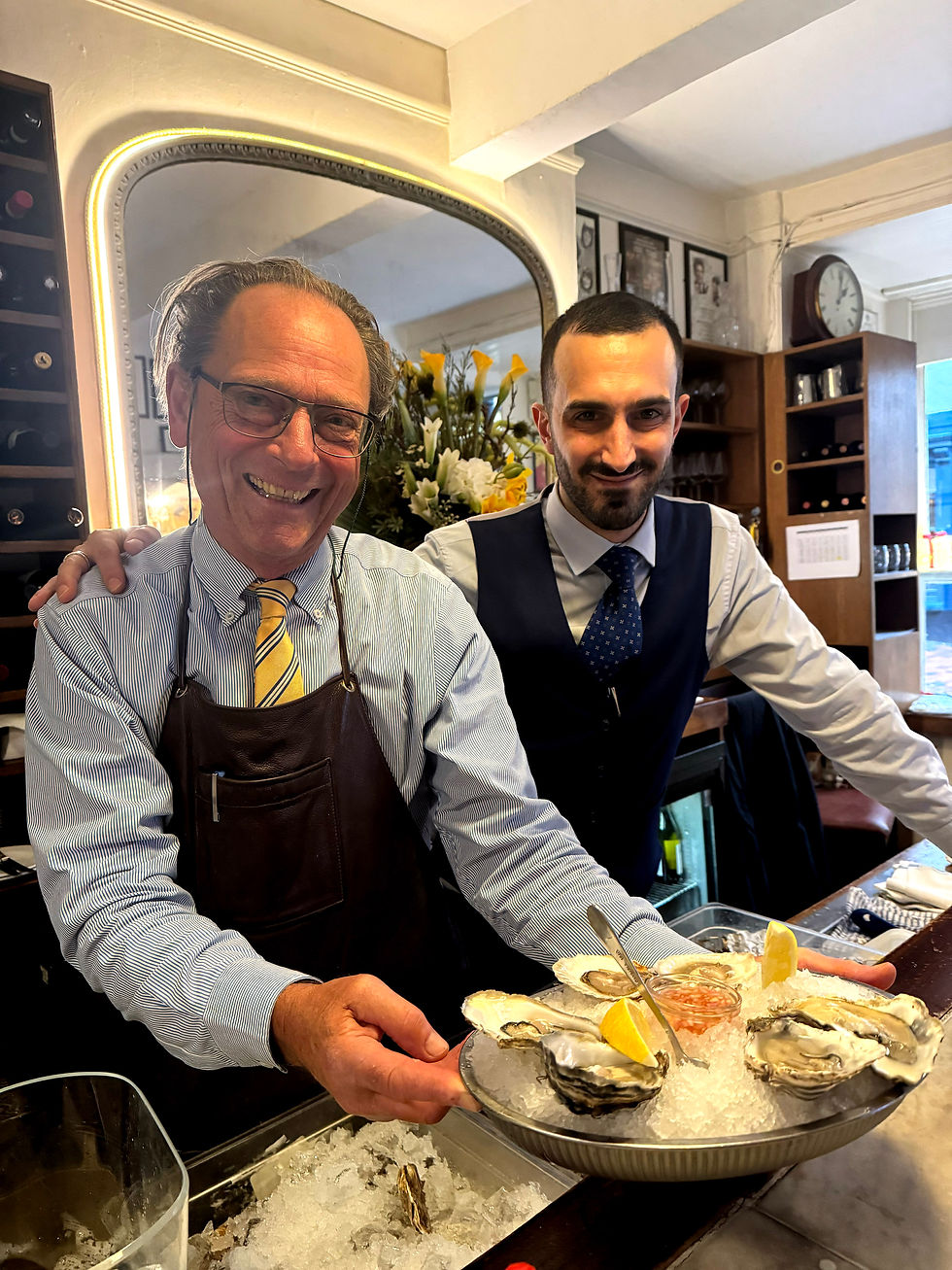 Oyster specialist Jonathan Spiers and assistant manager Antonio Manno at English's of Brighton