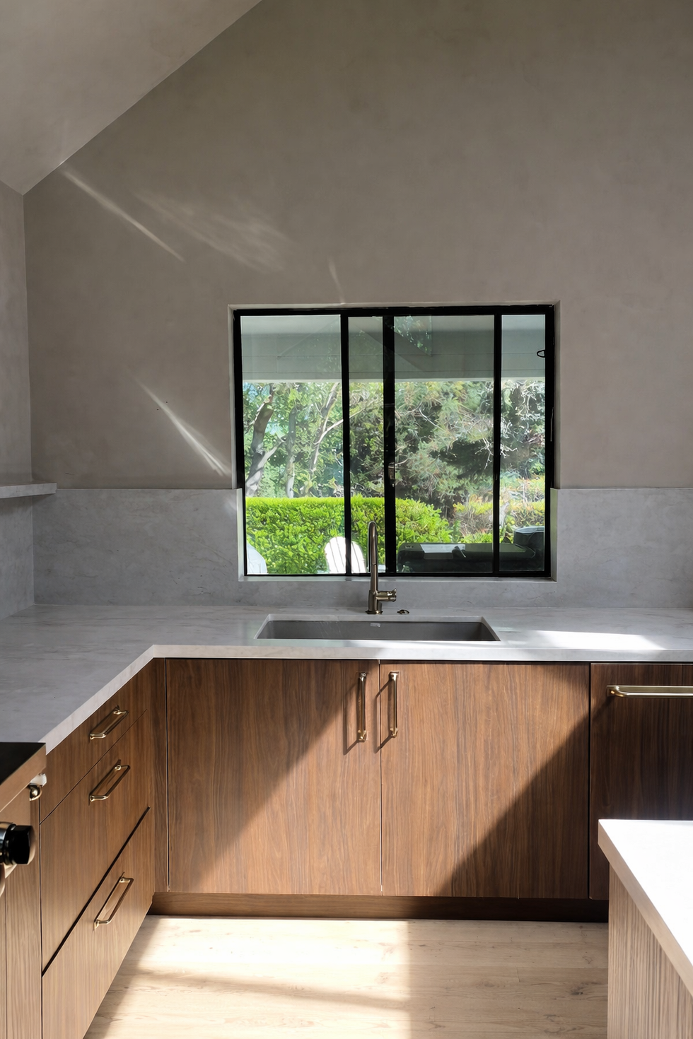 Modern kitchen with backyard view
