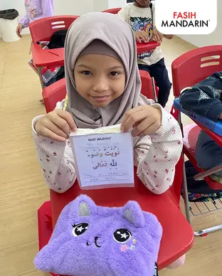 FMKids Daycare Center at Wangsa Maju showing Image of happy kids with her Kaabah replica.
