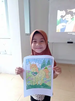 FMKids Daycare Center at Wangsa Maju showing Students colouring during their School Holiday Program.