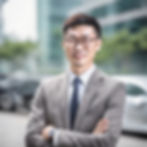 successful chinese business man looking at the camera_a _contact us for inquiry_ feeling.j