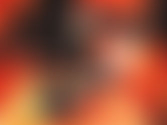 A stylized scene showing multiple Ledger cold wallets floating among geometric orange steps, with various models including touchscreen and button based devices arranged in a dynamic layout. The wallets appear suspended in mid air, highlighting sleek black finishes and illuminated displays that suggest digital security and control.